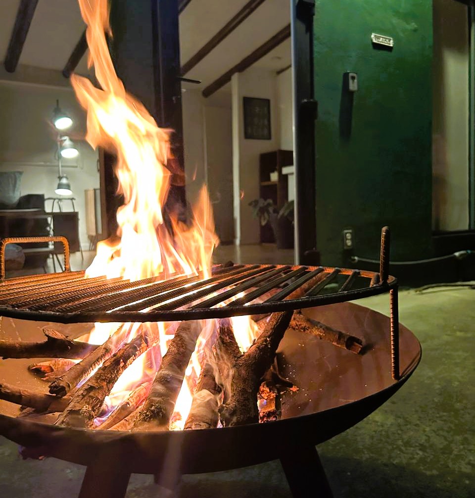 River Loft — parrilla con fuego